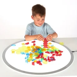 Bloques geométricos de colores translúcidos (180) - TickiT