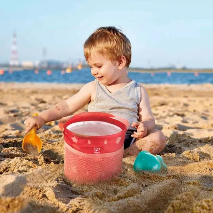 Bolsa de playa con cubo plegable, pala y molde - Hape