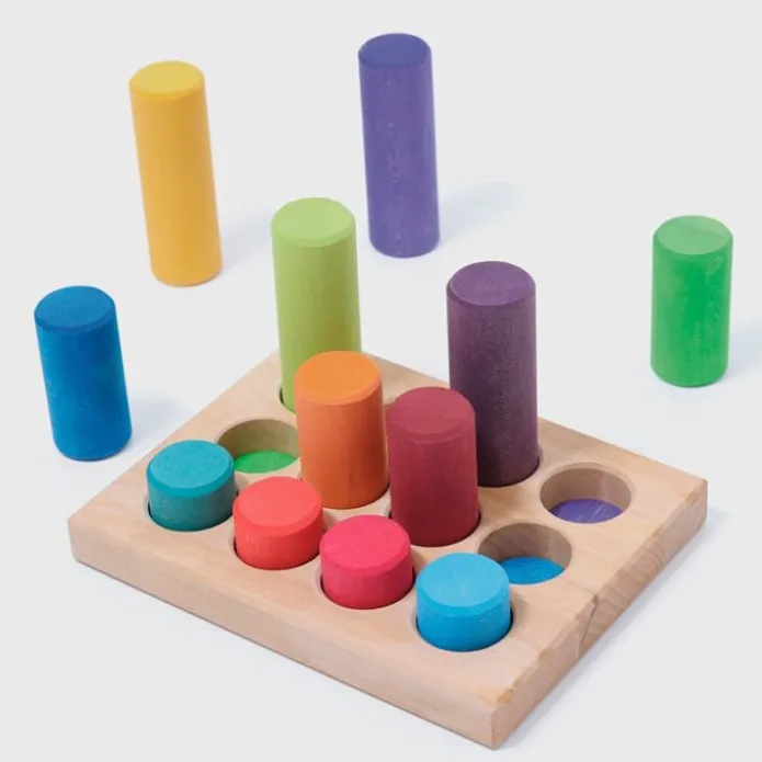 Cilindros de madera para encajar y construir colores arcoíris (12) - Grimm's