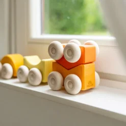 Coches de madera apilables naranjas (2) - Grimm's