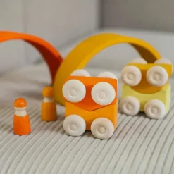 Coches de madera apilables naranjas (2) - Grimm's