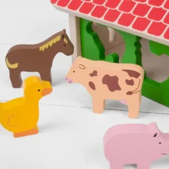Encajable de madera Granja con 8 animales - Bigjigs