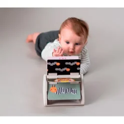 Libro giratorio para tummy time - Taf Toys