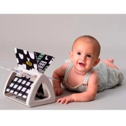 Libro giratorio para tummy time - Taf Toys