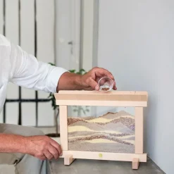 Marco creativo de madera con arena - JonEly