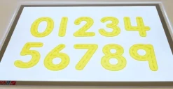 Números de silicona amarillo translúcido (10) - TickiT