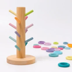 Organizador de madera para encajar y clasificar aros colores pastel - Grimm's