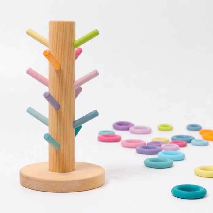 Organizador de madera para encajar y clasificar aros colores pastel - Grimm's