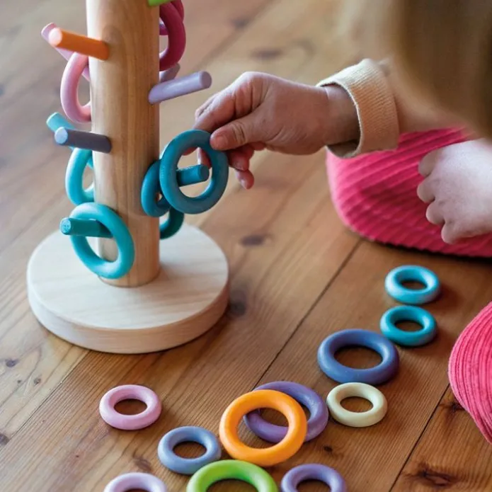 Organizador de madera para encajar y clasificar aros colores pastel - Grimm's
