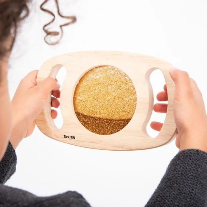 Panel sensorial de madera con purpurina dorada - TickiT