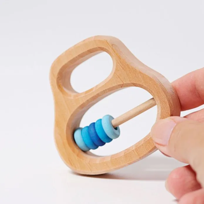 Sonajero y mordedor de madera con aros azules - Grimm's