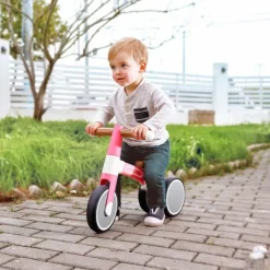 Triciclo correpasillos rosa pastel - Hape
